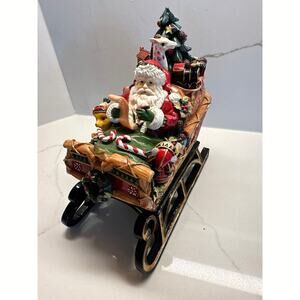 Fitz and Floyd Christmas Lodge Musical Figurine Santa Claus Sleigh
Hand Painted